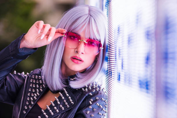istock Beautiful woman illuminated by led lights 1281651850