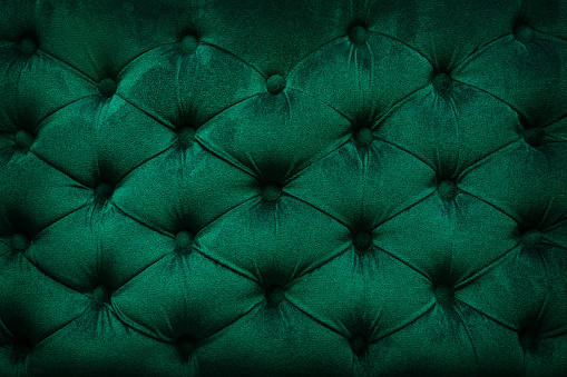 Tejido verde terciopelo acolchado photo