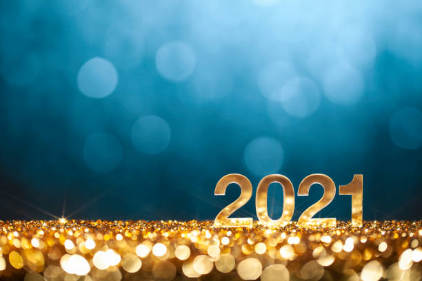 frohes neues jahr 2021 - weihnachten gold blau glitter - 2021 stock-fotos und bilder