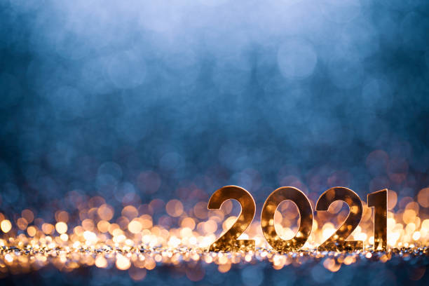 Happy New Year 2021 - Christmas Gold Blue Glitter Golden numbers 2021 on glitter and defocused lights. 2021 stock pictures, royalty-free photos & images