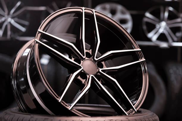 new alcoa alloy forged wheels in the car shop. sales of tires and wheels, automotive products. thin spokes and light weight, sporty design stock photo