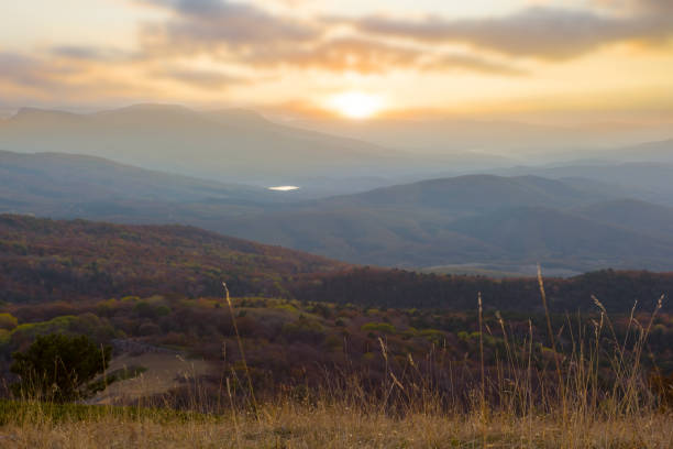 istock mountain valley in a blue mist at the sunset 1281659442