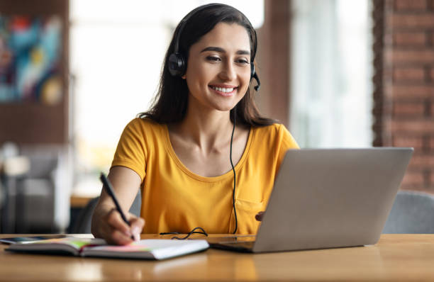 istock Happy young arab woman having educational course online 1281659854