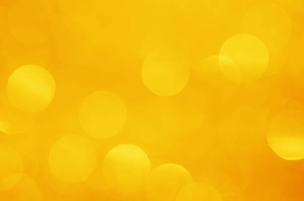 istock glitter light sparkle yellow golden gorgeous bokeh defocused abstract background shiny. 1281660439