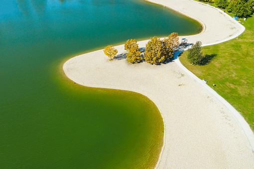 Beautiful blue lake in Bundek park in autumn in Zagreb, Croatia