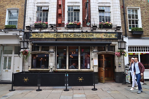 People visit The Two Brewers pub in London. It is a typical London pub. There are more than 7,000 pubs in London.