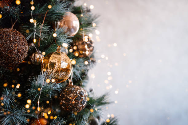 istock Christmas tree with golden decoration and bokeh. 1281664875