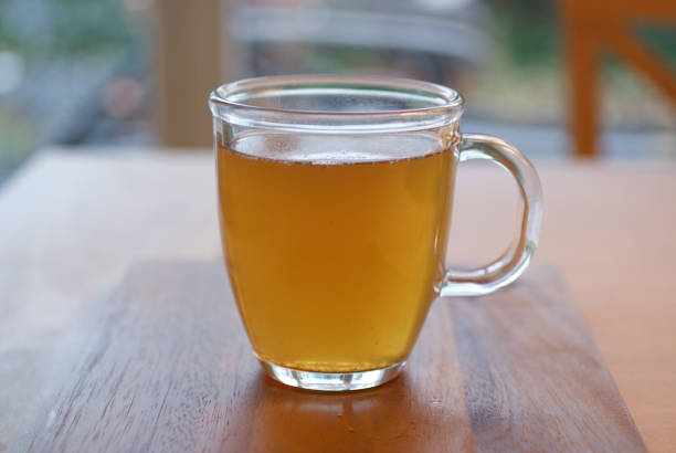 istock Organic Lemon Green tea in  Transparent cup at table near window 1281666430