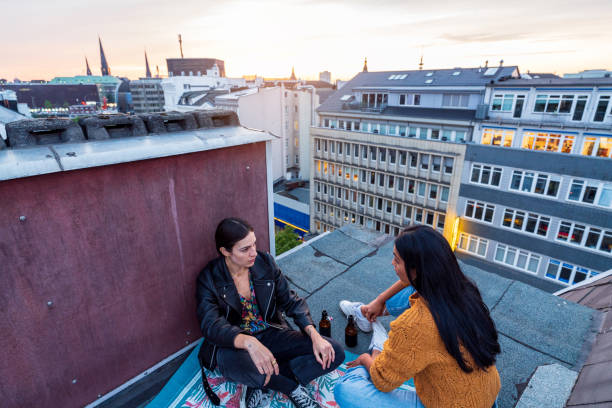 istock Gossip girls on a rooftop 1281669275