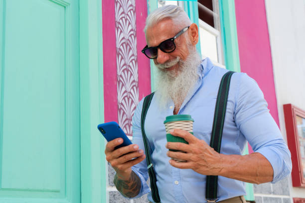 istock Senior man with a phone 1281669517