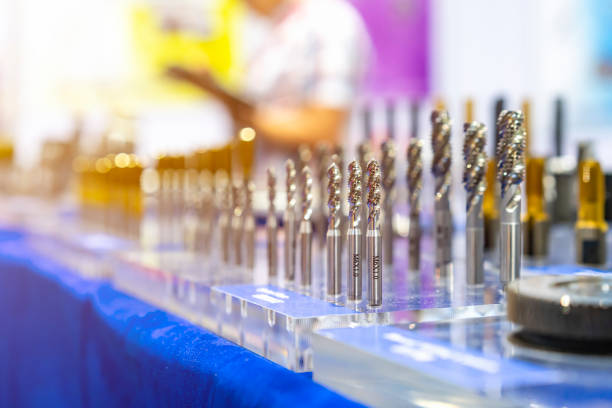 istock New and precision metal spiral or screw tapping cutting tools for threaded hole making in manufacturing process on table 1281671606