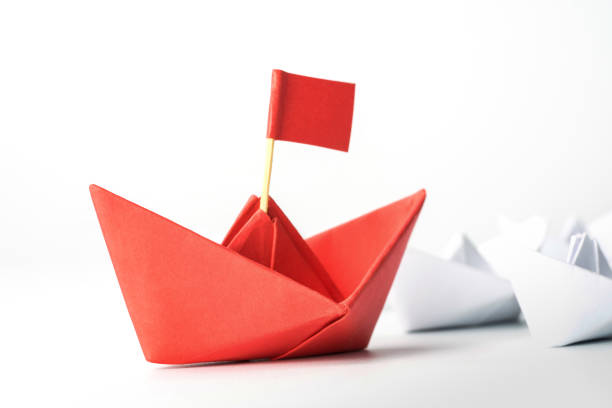istock Leadership and Success concept with red paper ship. 1281673264