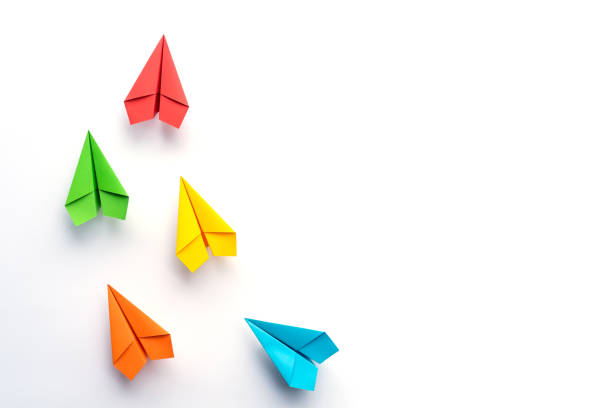 istock Paper plane on white background. Business competition concept. 1281673342