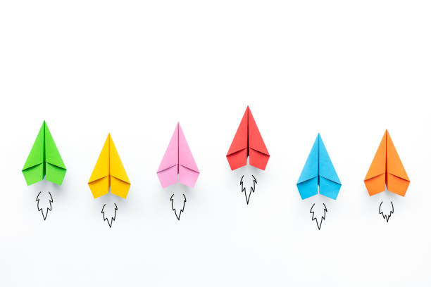 istock Paper planes on white background. Business competition concept. 1281673350