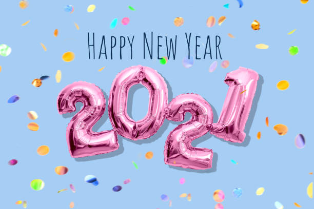 istock Shiny numbers 2021 with multicolored confetti, happy new year concept 1281674146