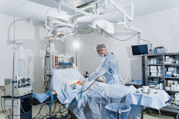istock Abdominoplasty plastic operation to reduce the abdomen and remove cellulite. Correcting body shape. Surgeon does liposuction for patient in medical clinic 1281674334
