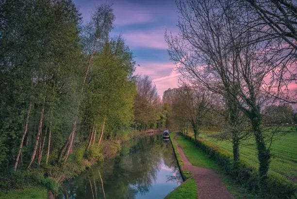A tranquil spring morning along the Birmingham and Fazeley Canal near Drayton in Staffordshire, UK