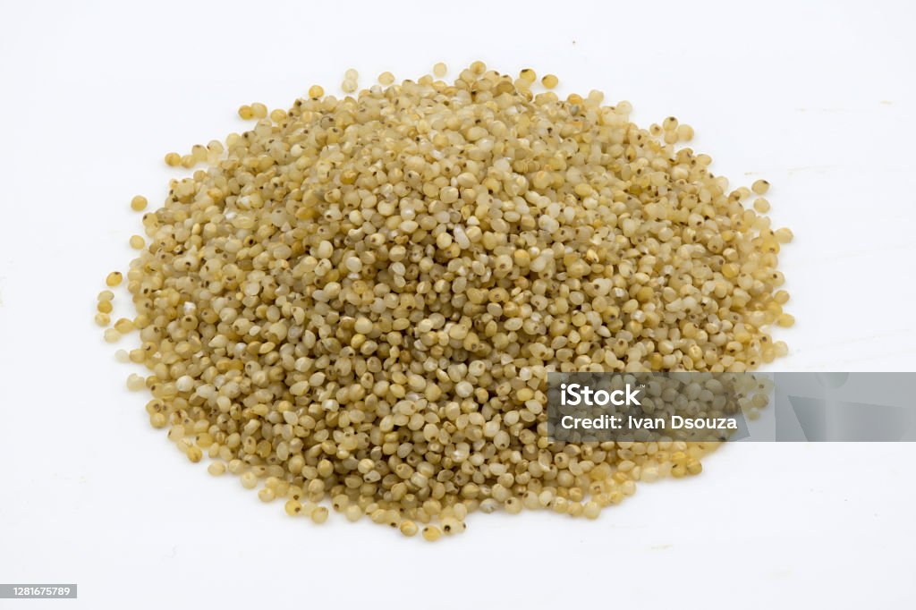 Close-up of barnyard millet grains Close-up of barnyard millet grains on an isolated white background Barn Stock Photo