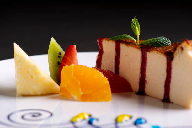 istock Close-up cheesecake with cherry sauce and fruits 1281676133