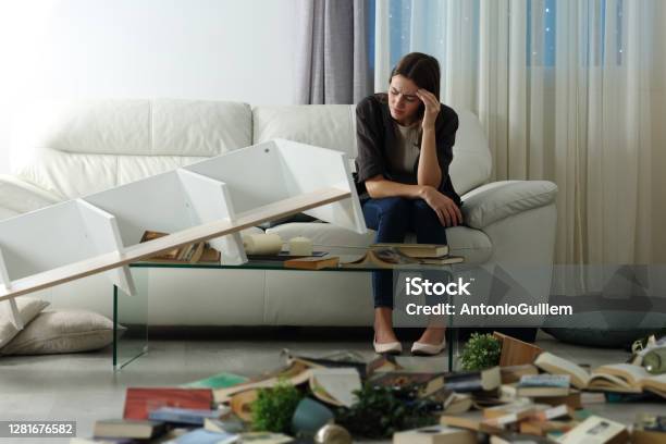 Sad Tenant Complaining After Home Robbery In The Night Stock Photo - Download Image Now