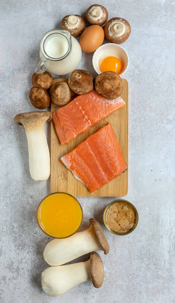 istock Vertical composition with products rich in vitamin D 1281676736