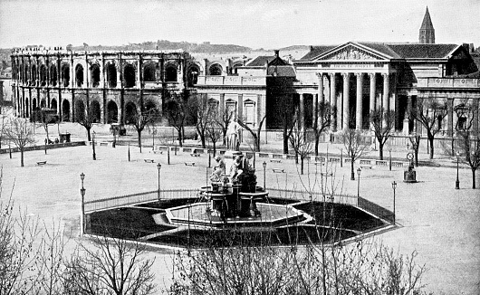 Fontaine Pradier, Palais de Justice de Nimes and Arena of Nimes in Nimes, France. Vintage half tone etching circa 19th century.