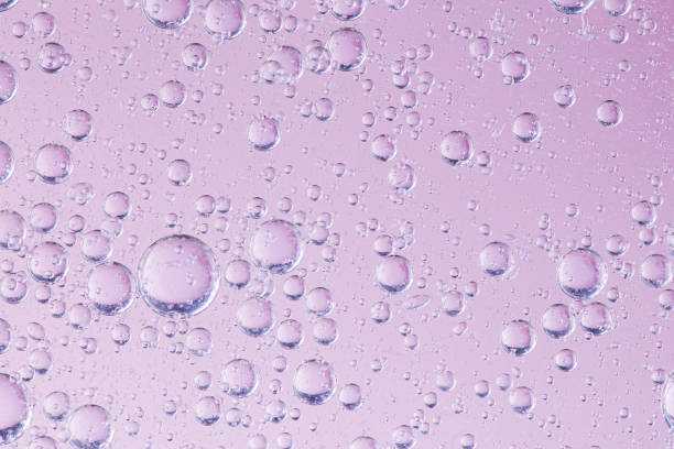 istock Pink foam texture. Shiny bubble water background. Washing suds pattern. 1281679308