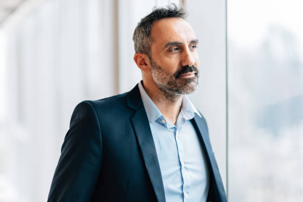 istock Businessman Portrait in Office space 1281680223