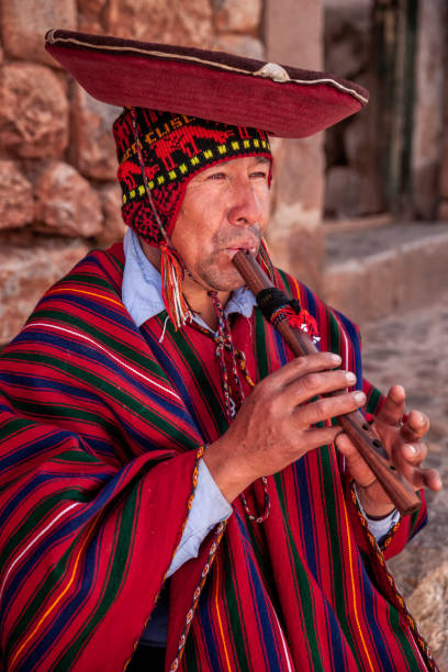 istock Portrait of Peruvian man playing a flute, Sacred Valley 1281680512