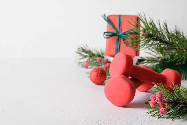 istock Christmas frame with gift, fir branches on white. Copy space. Xmas greeting card. 1281680725