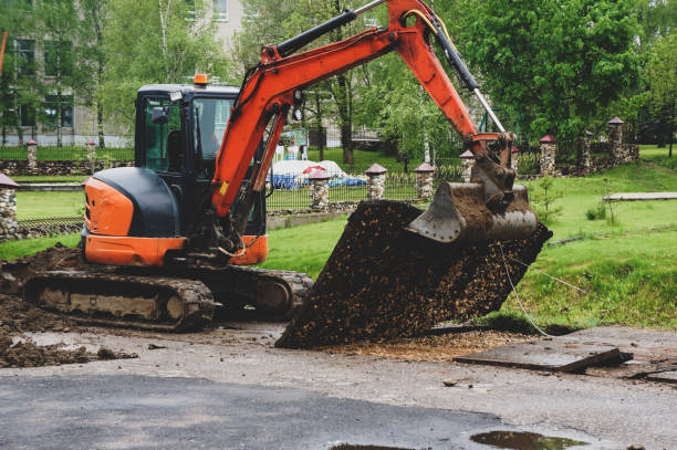 istock Dig asphalt with a tractor bucket 1281687215