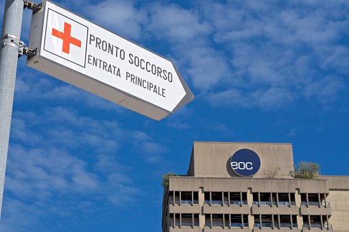 Lugano, Ticino, Switzerland - 14th October 2020 : View of the Emergency Room sign hanging in front of the Civico Hospital in Lugano, Switzerland