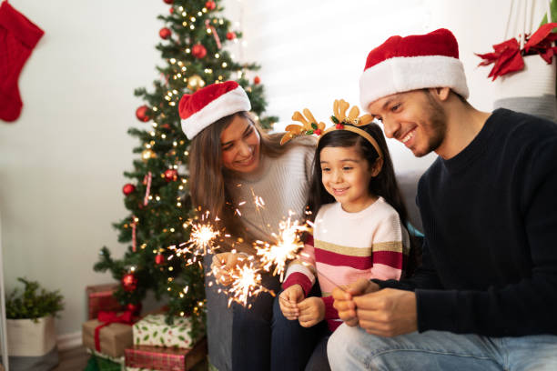 istock Hispanic family lighting sparklers at home 1281689137