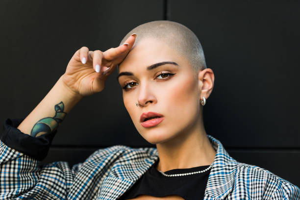 istock Beautiful woman with shaved hair 1281691173