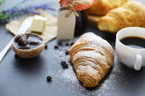istock Fresh pastries on the table. French flavored croissant. 1281697187