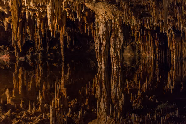 istock Reflecting pool in Luray Cavern, Virginia, USA 1281698223
