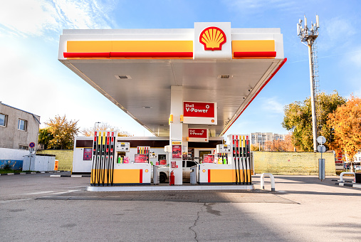 Samara, Russia - October 8, 2020: Shell gas station in sunny day. Shell V-power petrol station. Royal Dutch Shell is an Anglo-Dutch multinational oil and gas company