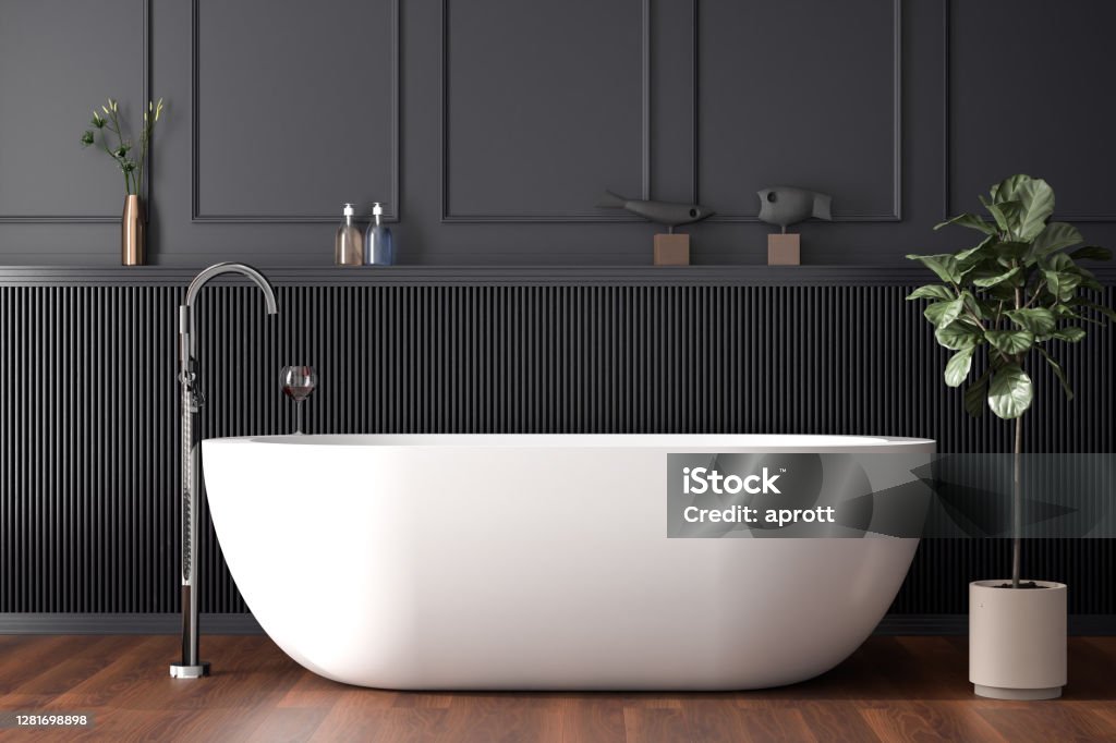 White free standing baththub in a dark paneled bathroom. 3d render Bathroom Stock Photo