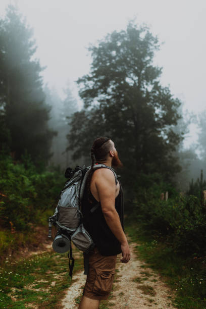 istock Men with long beard admiring the nature 1281699844