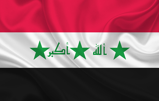 Flag of Iraq country on wavy silk fabric background panorama - illustration