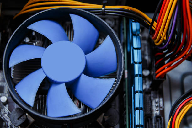 istock Heatsink and fan of central processing or the CPU cooler inside pc system unit. 1281705369