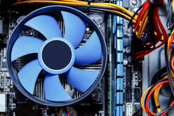 Photo of Heatsink and fan of central processing or the CPU cooler inside pc system unit.