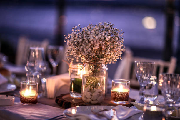 Candles burning in place setting Candles burning in place setting candle light dinner stock pictures, royalty-free photos & images