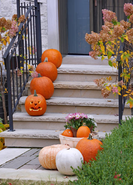 istock Front steps of house with autumn and Halloween decorations 1281713669