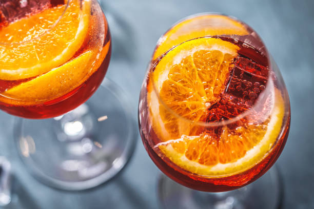 istock Spritz cocktail with orange slices served in glasses. 1281714257