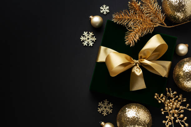 istock Christmas golden deco on dark 1281714259