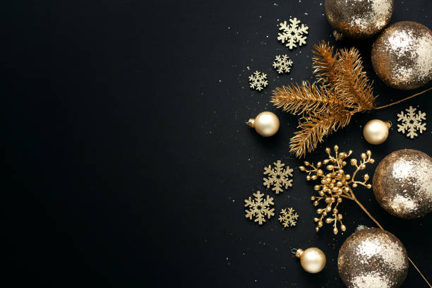 istock Christmas golden deco on dark 1281714410