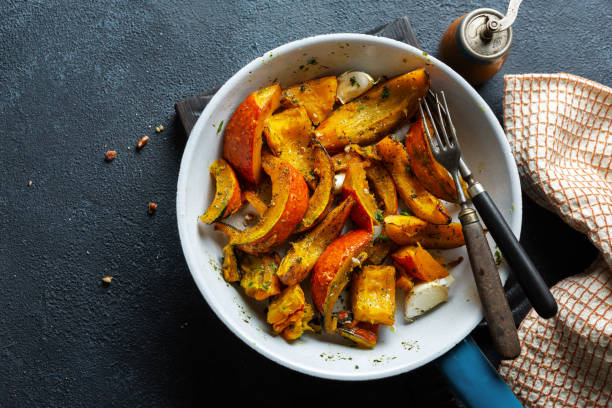 istock Roasted chunks of pumpkin with spices. 1281714507