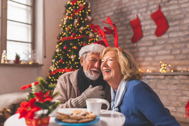 istock Senior couple singing Christmas songs 1281723059