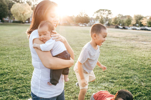 istock Family with three kids having fun 1281725465